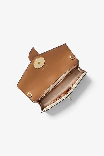 Michael Kors
Signature Mk Charm Mid Wallet On Chain Crossbody
