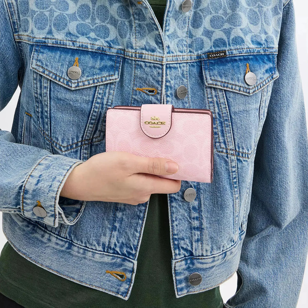 Powder pink coach wallet