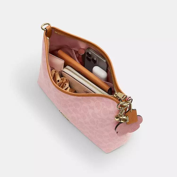 Laurel Shoulder Bag
In Signature Canvas With Charms