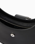 Crescent shoulder bag with a front flap and logo buckle (Armani Exchange)