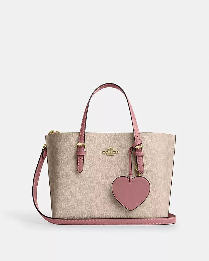MOLLIE TOTE BAG 25 IN SIGNATURE CANVAS WITH HEART CHARM