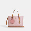 Mollie Tote Bag 25
In Signature Canvas With Charm