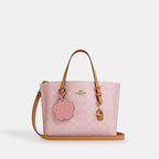 Mollie Tote Bag 25
In Signature Canvas With Charm