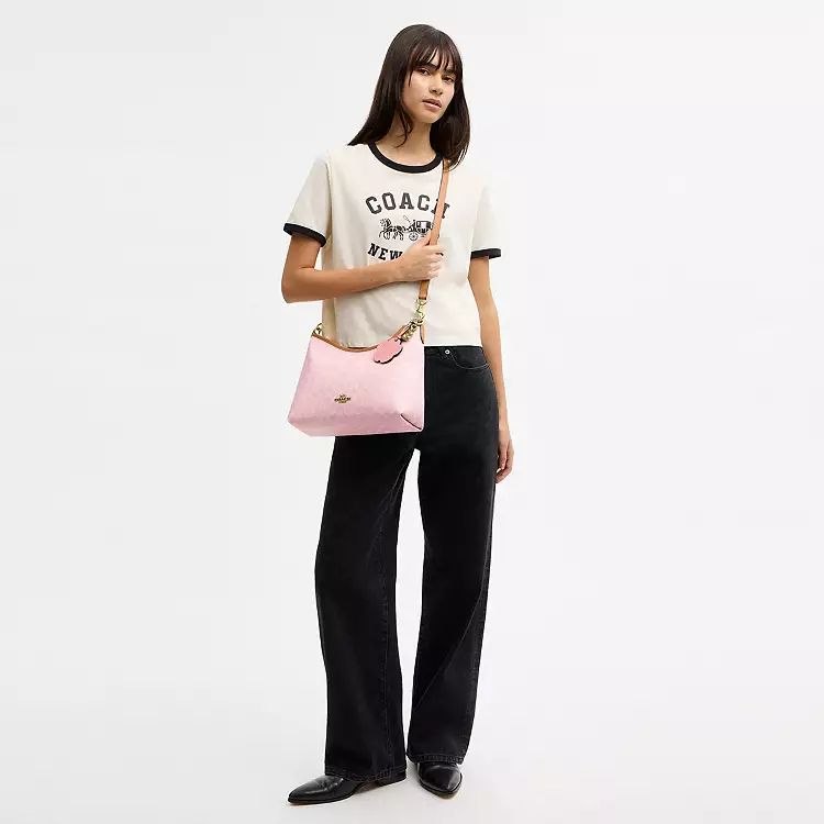 Laurel Shoulder Bag
In Signature Canvas With Charms