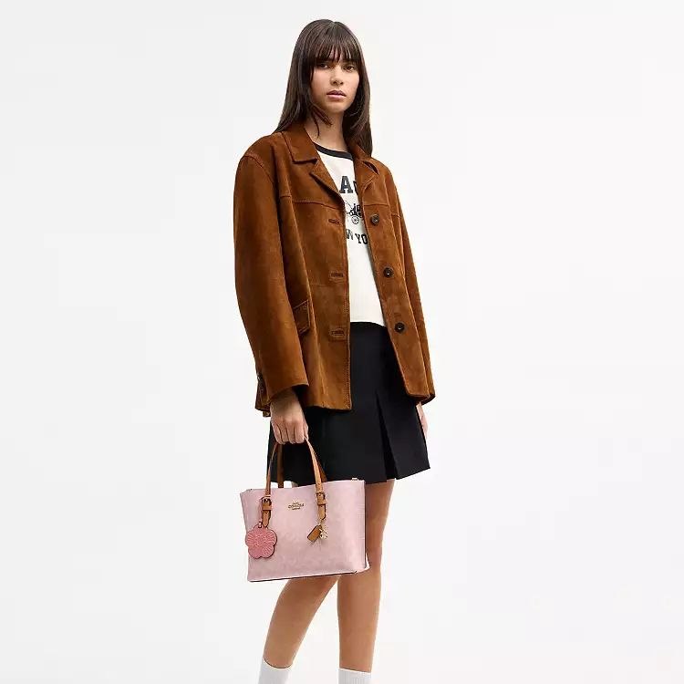 Mollie Tote Bag 25
In Signature Canvas With Charm