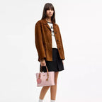 Mollie Tote Bag 25
In Signature Canvas With Charm