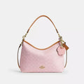 Laurel Shoulder Bag
In Signature Canvas With Charms