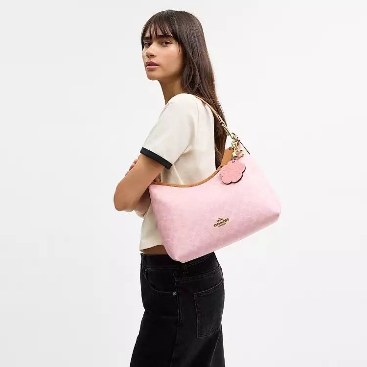 Laurel Shoulder Bag
In Signature Canvas With Charms